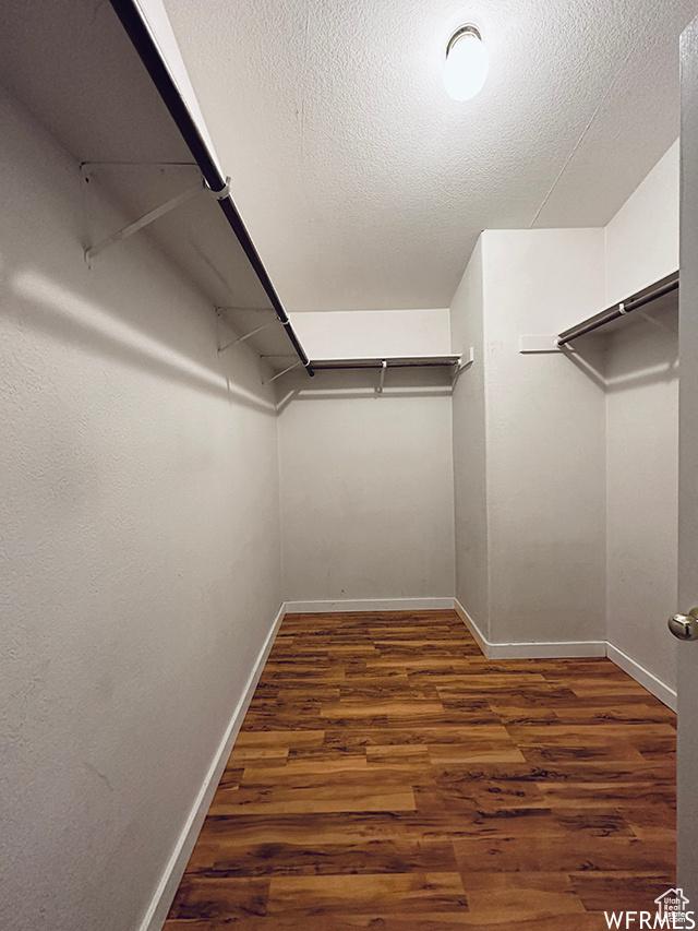 2103 S Mountain Vista Ln E, Provo, UT 84606 - spacious closet featuring wood finished floors