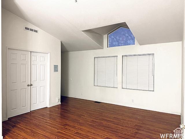2103 S Mountain Vista Ln E, Provo, UT 84606 - interior space with visible vents, lofted ceiling, and wood finished floors