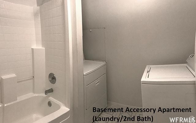 2103 S Mountain Vista Ln E, Provo, UT 84606 - bathroom featuring independent washer and dryer and shower / bathtub combination