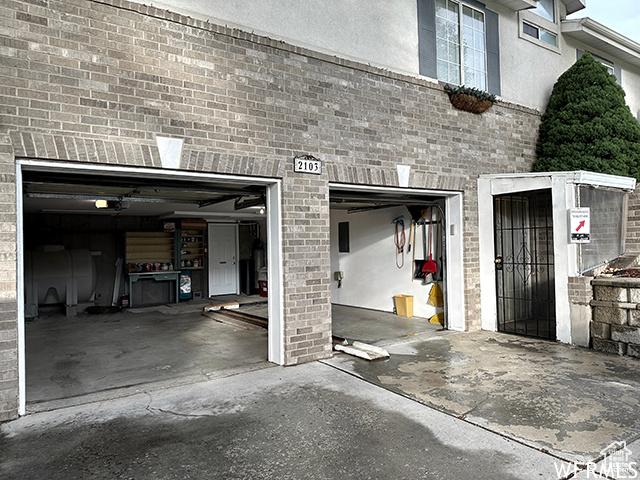 2103 S Mountain Vista Ln E, Provo, UT 84606 - garage featuring driveway
