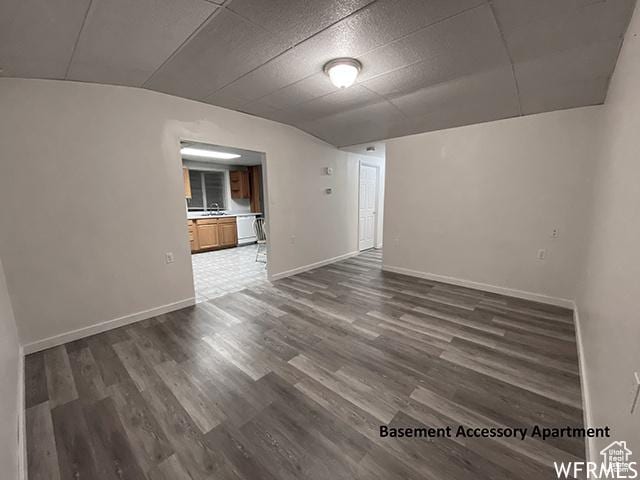 2103 S Mountain Vista Ln E, Provo, UT 84606 - spare room with baseboards and dark wood-style floors