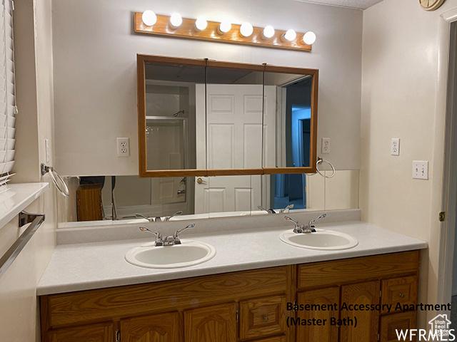 2103 S Mountain Vista Ln E, Provo, UT 84606 - full bath featuring double vanity and a sink