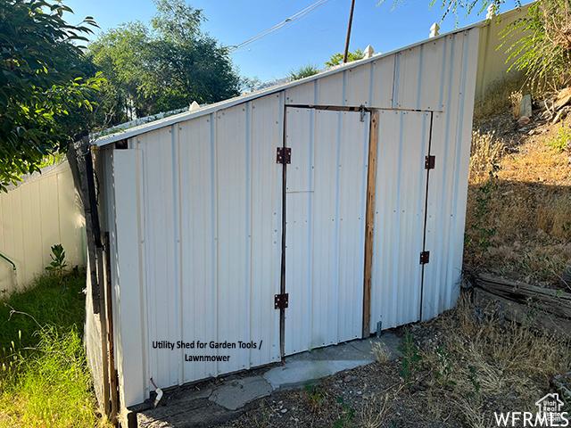 2103 S Mountain Vista Ln E, Provo, UT 84606 - view of shed featuring a fenced backyard