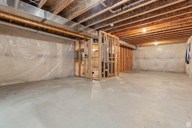 unfinished basement with electric panel