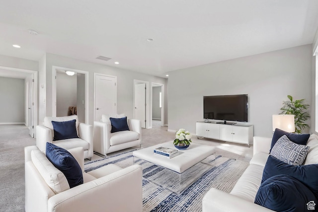 living room with light carpet, baseboards, visible vents, and recessed lighting