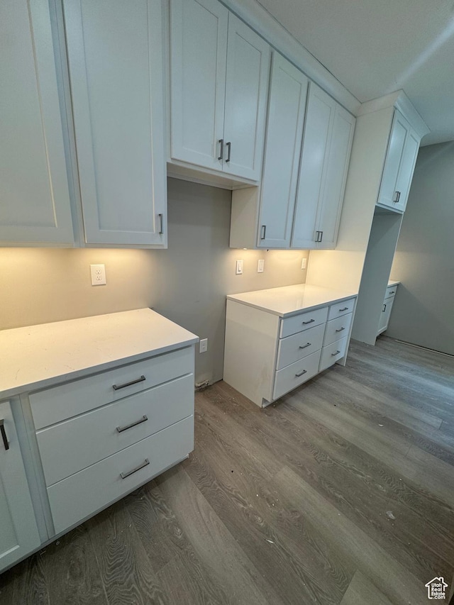 1870 N Valley View Dr Unit 201, Layton, UT 84040 - kitchen with dark wood-type flooring, white cabinetry, and light countertops