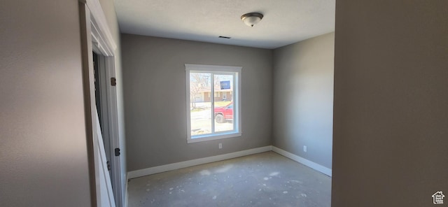 1870 N Valley View Dr Unit 201, Layton, UT 84040 - spare room with baseboards and concrete floors