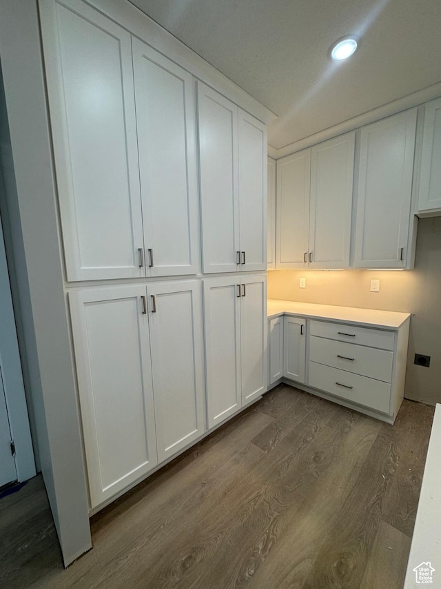 1870 N Valley View Dr Unit 201, Layton, UT 84040 - kitchen featuring dark wood-type flooring, white cabinets, light countertops, and recessed lighting