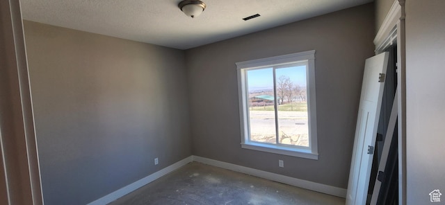 1870 N Valley View Dr Unit 201, Layton, UT 84040 - unfurnished room featuring concrete flooring and a textured ceiling
