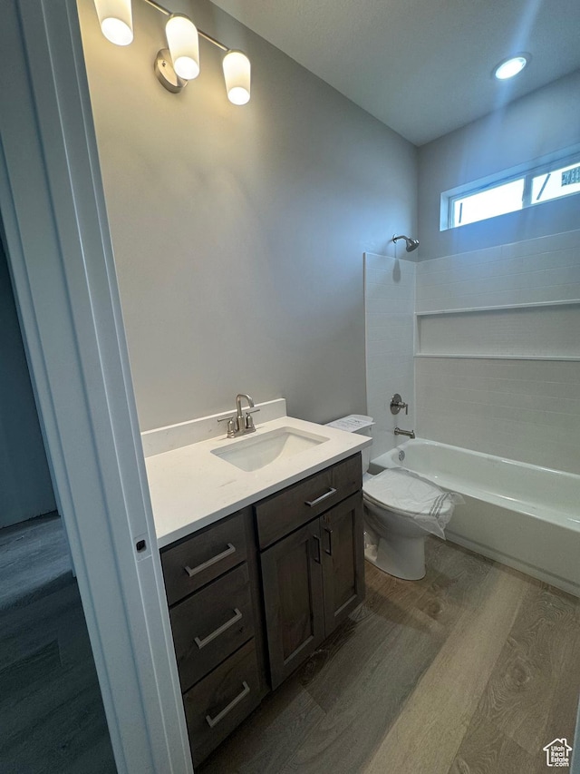 1870 N Valley View Dr Unit 201, Layton, UT 84040 - bathroom with wood finished floors, vanity, and shower / washtub combination