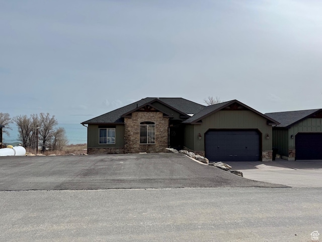 29 W Tamarind Way, Garden City, UT 84028 - single story home featuring a garage, driveway, and stone siding