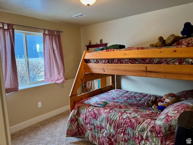 29 W Tamarind Way, Garden City, UT 84028 - bedroom featuring carpet floors, baseboards, and visible vents