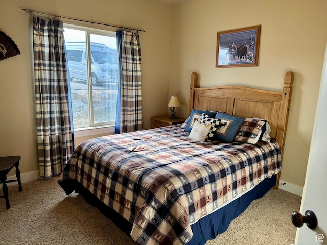 29 W Tamarind Way, Garden City, UT 84028 - bedroom featuring baseboards and carpet