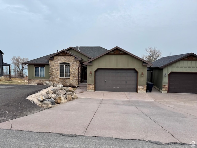 29 W Tamarind Way, Garden City, UT 84028 - single story home featuring a garage, a shingled roof, driveway, and stone siding