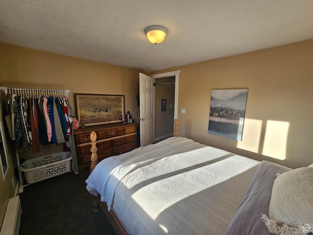 carpeted bedroom featuring a closet