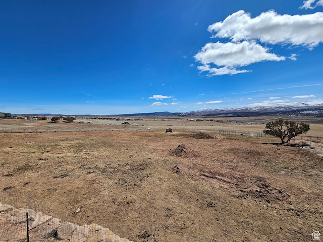 exterior space with a rural view