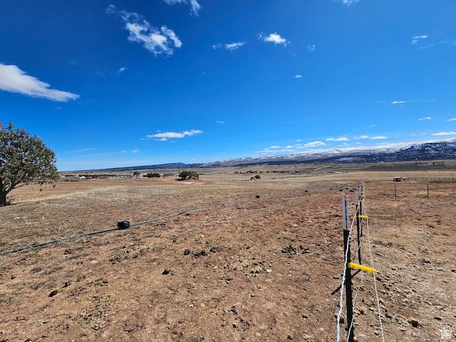 exterior space with a mountain view and a rural view