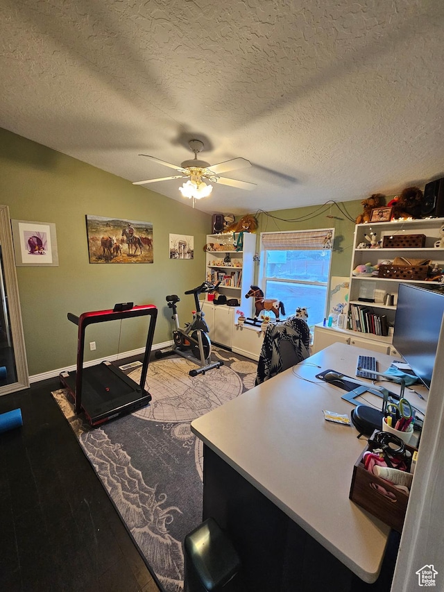 office area with a ceiling fan, a textured ceiling, baseboards, and wood finished floors