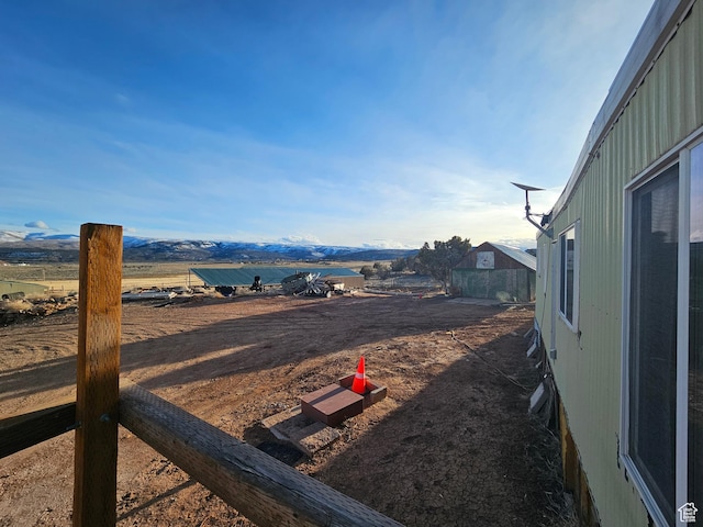 view of yard with a mountain view