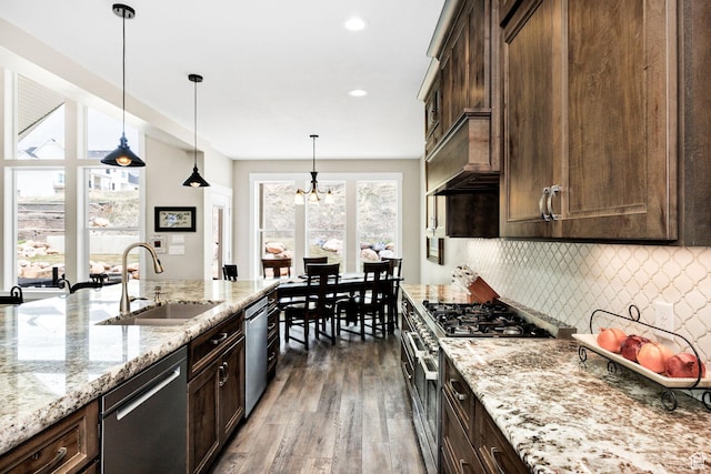 116 N 820 E, Hyde Park, UT 84318 - kitchen with dark brown cabinets, dark wood-style flooring, a sink, and stainless steel appliances