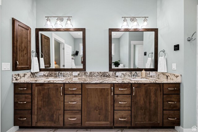 116 N 820 E, Hyde Park, UT 84318 - bathroom featuring double vanity and a sink