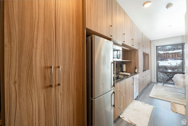 2670 W Canyons Resort Dr Unit 432, Park City, UT 84098 - kitchen with modern cabinets, appliances with stainless steel finishes, and wood finished floors
