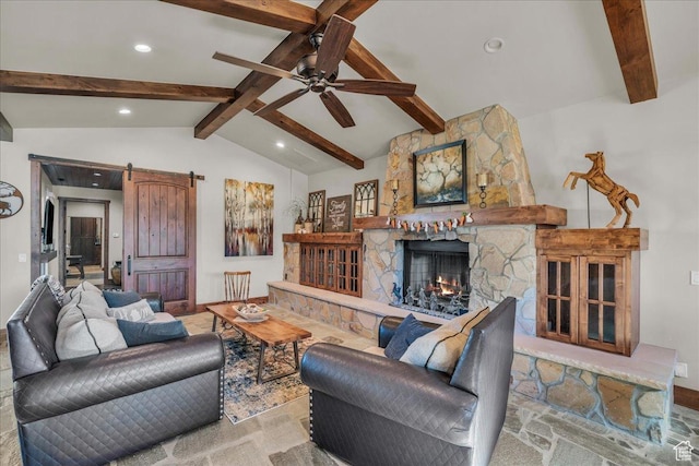 580 S 920 W, Hurricane, UT 84737 - living area featuring ceiling fan, recessed lighting, a stone fireplace, a barn door, and vaulted ceiling with beams
