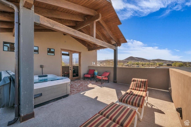 580 S 920 W, Hurricane, UT 84737 - view of patio / terrace featuring a hot tub, a mountain view, and french doors