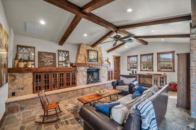 580 S 920 W, Hurricane, UT 84737 - living room featuring visible vents, a fireplace, ceiling fan, stone tile flooring, and vaulted ceiling with beams
