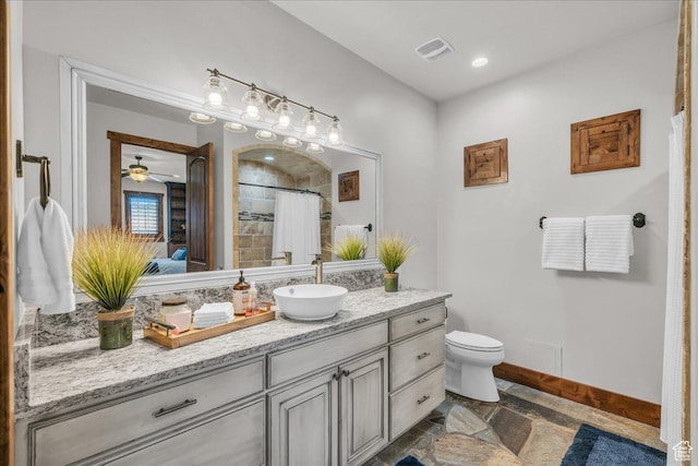 580 S 920 W, Hurricane, UT 84737 - full bath with toilet, vanity, stone finish floor, baseboards, and visible vents