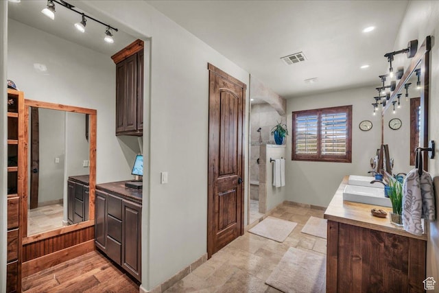 580 S 920 W, Hurricane, UT 84737 - full bath featuring vanity, stone finish floor, baseboards, and visible vents