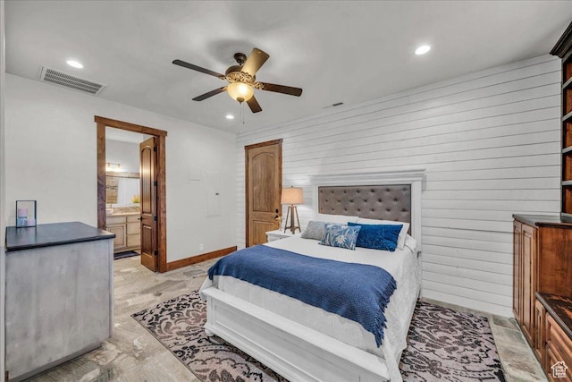 580 S 920 W, Hurricane, UT 84737 - bedroom featuring wood walls, ensuite bath, ceiling fan, and visible vents