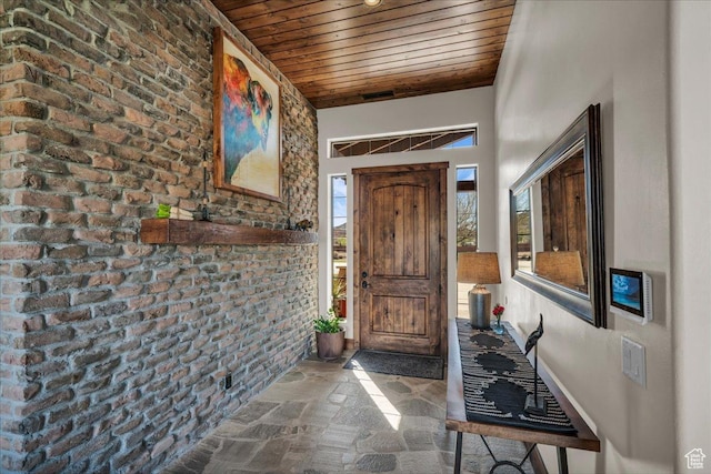 580 S 920 W, Hurricane, UT 84737 - foyer featuring brick wall, wooden ceiling, and stone tile flooring