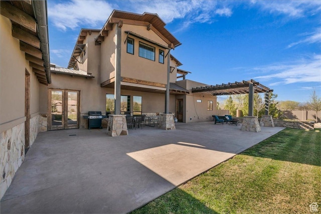 580 S 920 W, Hurricane, UT 84737 - back of property with a lawn, a pergola, stucco siding, and a patio