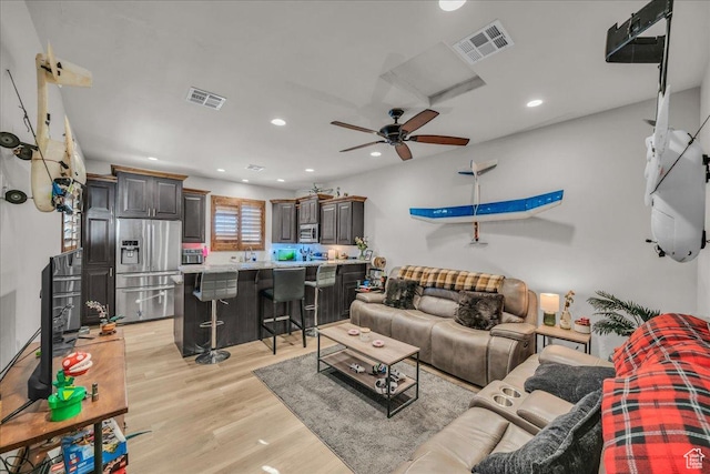 580 S 920 W, Hurricane, UT 84737 - living room featuring light wood-type flooring, recessed lighting, and visible vents