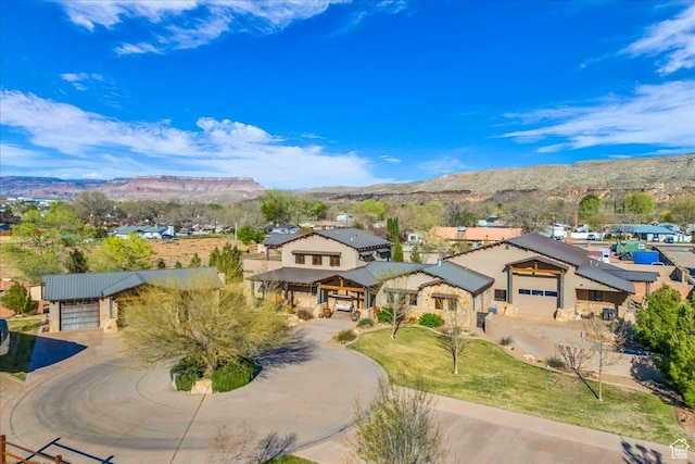 aerial view featuring a mountain view and a residential view