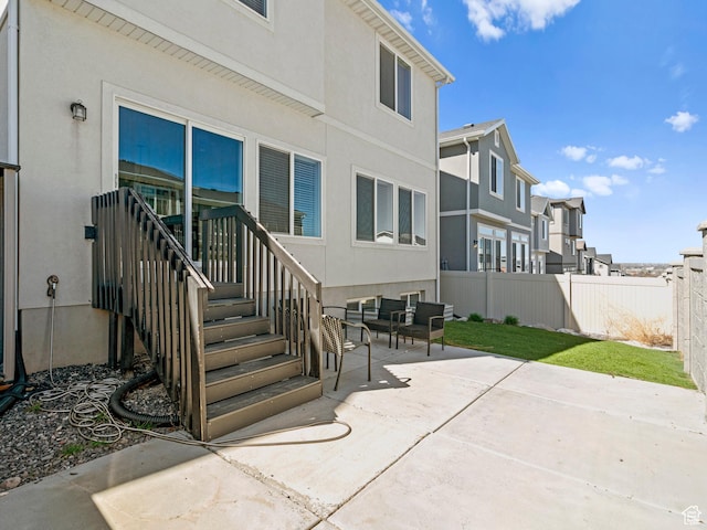 14353 S Ashvale Dr, Herriman, UT 84096 - view of patio featuring fence and a residential view