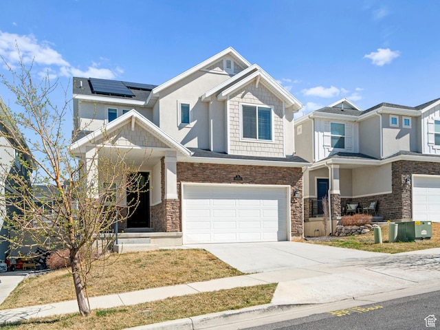 14353 S Ashvale Dr, Herriman, UT 84096 - craftsman-style home with a garage, solar panels, concrete driveway, and stucco siding
