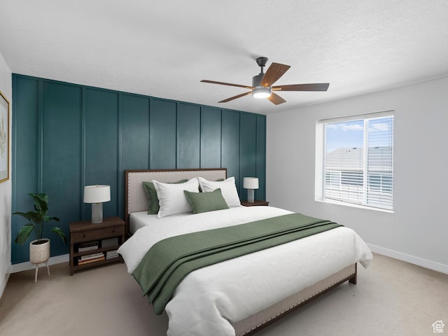 14353 S Ashvale Dr, Herriman, UT 84096 - bedroom with light carpet, baseboards, and ceiling fan