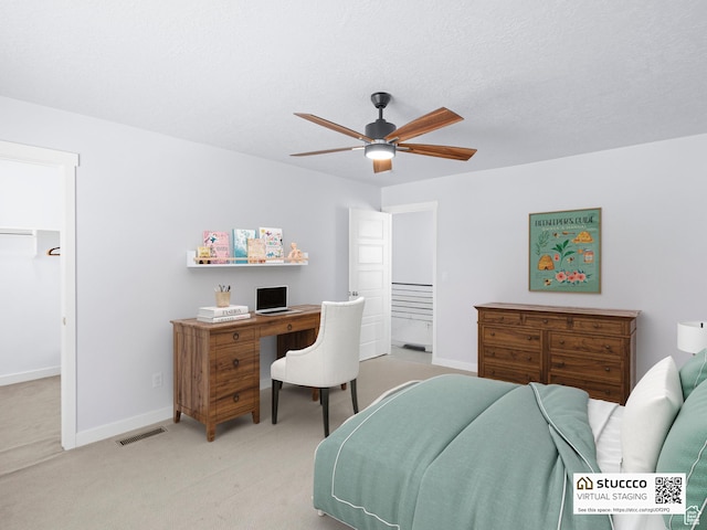 14353 S Ashvale Dr, Herriman, UT 84096 - bedroom with light carpet, an office area, baseboards, and a ceiling fan