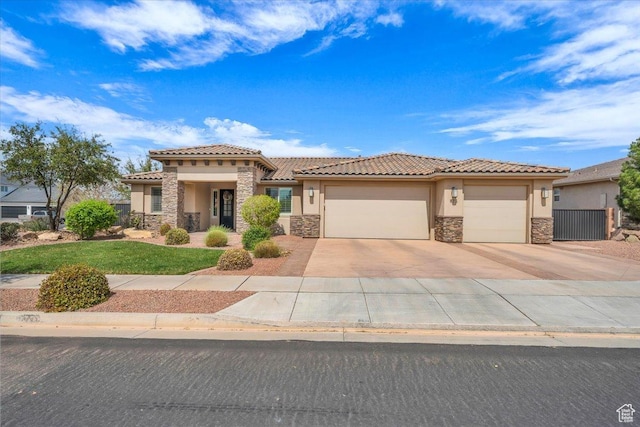 875 E Roadrunner Dr, Washington, UT 84780 - mediterranean / spanish home featuring stone siding, a tile roof, and stucco siding