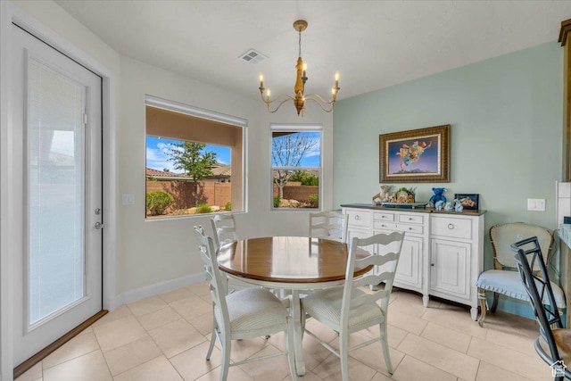 875 E Roadrunner Dr, Washington, UT 84780 - dining space featuring baseboards, visible vents, a notable chandelier, and light tile patterned floors