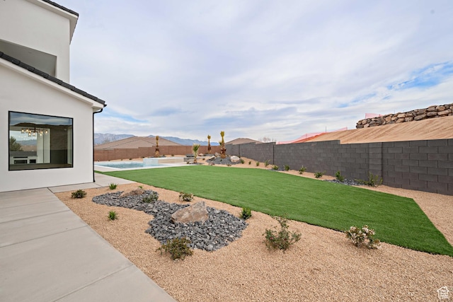 1516 W 800th Cir S, Hurricane, UT 84737 - view of yard featuring a fenced in pool, a fenced backyard, and a patio area