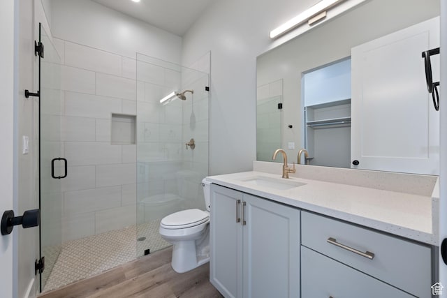 1516 W 800th Cir S, Hurricane, UT 84737 - full bath featuring a stall shower, toilet, wood finished floors, and vanity
