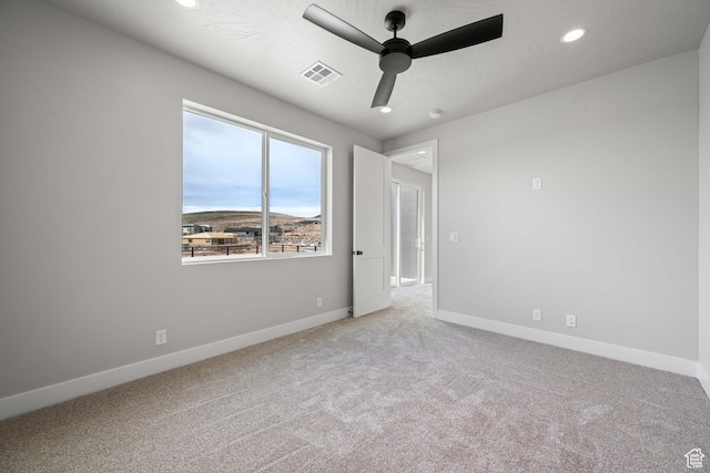 1516 W 800th Cir S, Hurricane, UT 84737 - carpeted empty room featuring a ceiling fan, recessed lighting, baseboards, and visible vents