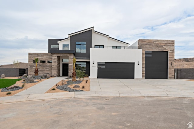 1516 W 800th Cir S, Hurricane, UT 84737 - contemporary house featuring driveway, stone siding, stucco siding, a balcony, and a garage
