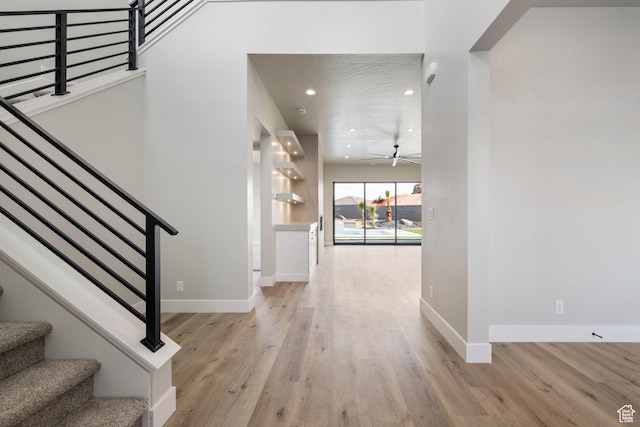 1516 W 800th Cir S, Hurricane, UT 84737 - foyer with baseboards, stairs, wood finished floors, and a ceiling fan