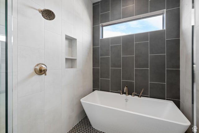 1516 W 800th Cir S, Hurricane, UT 84737 - full bathroom featuring a soaking tub, tiled shower, and tile walls