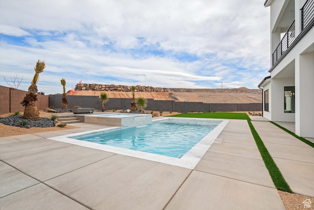 1516 W 800th Cir S, Hurricane, UT 84737 - view of pool with a fenced backyard, a fenced in pool, a mountain view, and a patio area