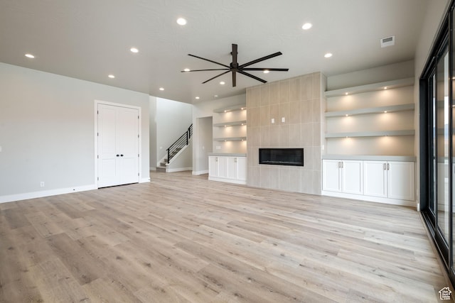 1516 W 800th Cir S, Hurricane, UT 84737 - unfurnished living room featuring baseboards, visible vents, light wood-style flooring, and recessed lighting
